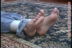 19 Year Old Blonde Bridgette Webb Tied Up Topless & Barefoot in Jeans