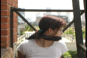 Alternative view of Asian Leah Iron Tied Up on the Fire Escape in Sneakers (4:45 min)