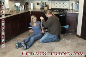 Lazy Maid Justine Adams Punished by Her Boss! Tied Topless to Her Broom, Socks Pulled Off & Feet Tickled! (10 min)