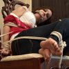 Movement Leader Mallory Page Chairtied, Cleave-Gagged, Soles Out, Keeping Her from Speech