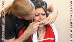 Alternative view of Housewife Natasha Flade Bound Barefoot in Robe, Double-Gagged & Groped by Home Intruder, Shows Off Her Soles! (FULL HD - 12 Min)