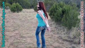 Alternative view of NEW FOOTAGE! Camp Counselor Natasha Flade Marched Bound & Gagged Through Woods, then Tied to Post! (FULL HD - 9:50 min)